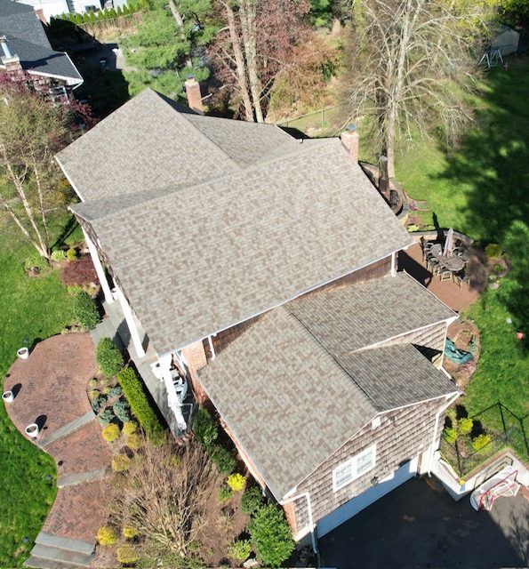 Aerial view of a tan shingle roof