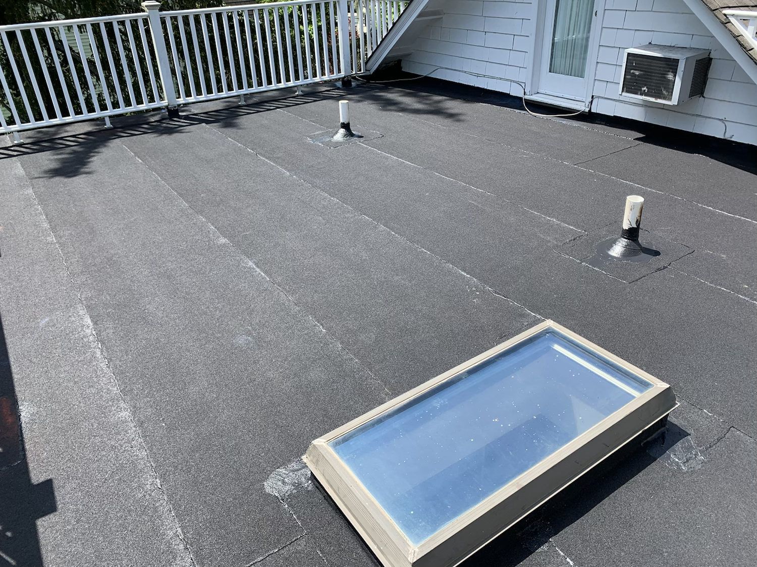 New flat roof with a skylight