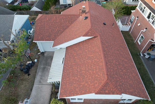 Aerial view of a red shingle roof