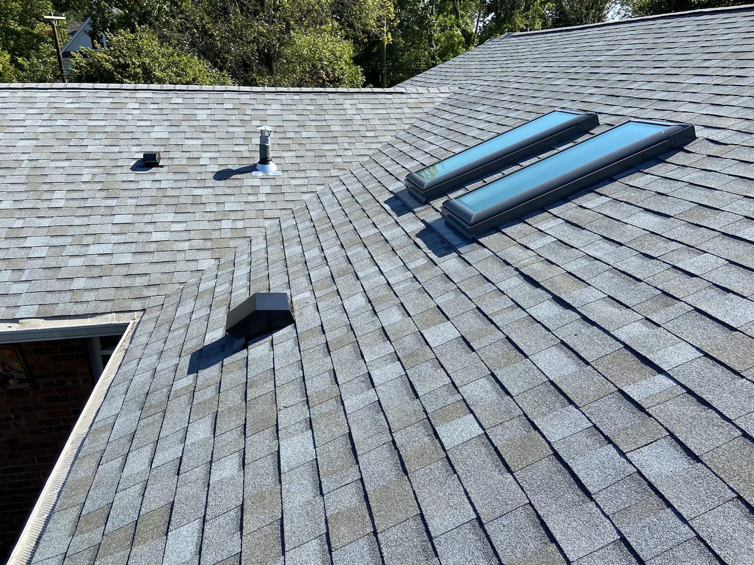 New architectural shingle roof with skylights